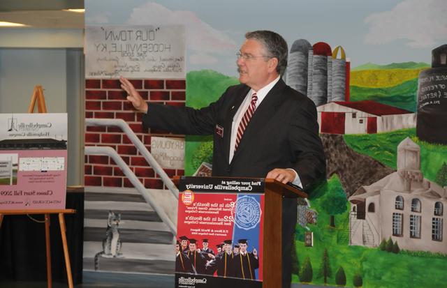 Dr. Keith Spears, vice president for regional and professional education at CU, who oversees the off-campus sites, welcomes guests to the meeting at Hodgenville City Hall. (Campbellsville University Photo by Ashley Zsedenyi)